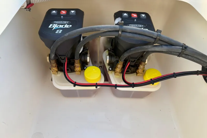 Slide: The Image of Power-Pole Blade 8 hydraulic pumps in a 2025 Pathfinder 2300 HPS boat. - 27