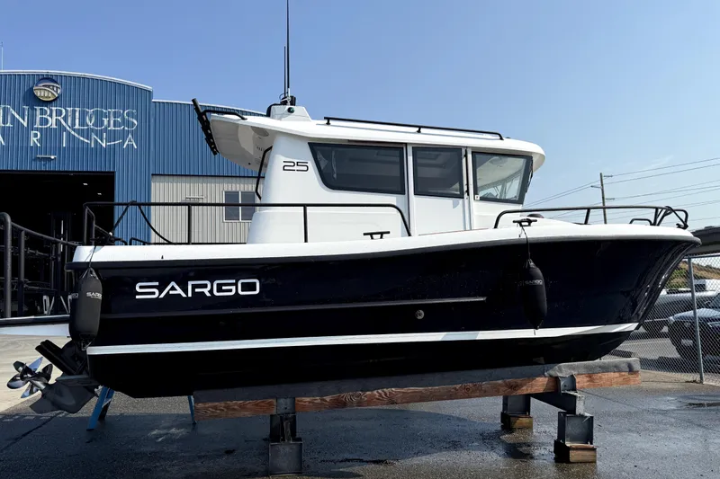 The Image of 2022 Sargo 25 boat on display at a marina, showcasing sleek design and modern features. - 0