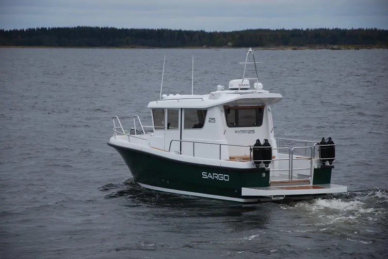 Slide: The Image of Sargo 25 boat 2022 cruising on calm waters. - 5