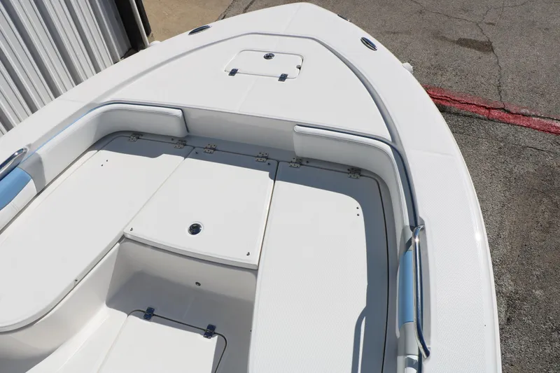 Slide: The Image of 2026 Robalo 226 Cayman boat deck with seating and storage compartments. - 22