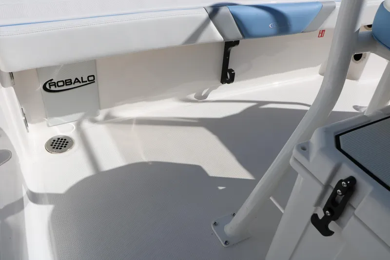 Slide: The Image of Interior view of 2026 Robalo 226 Cayman boat, showcasing seating and deck details. - 32