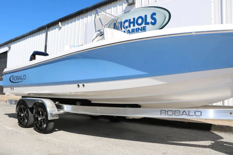 Slide: The Image of 2026 Robalo 226 Cayman boat on trailer at Nichols Marine dealership. - 41