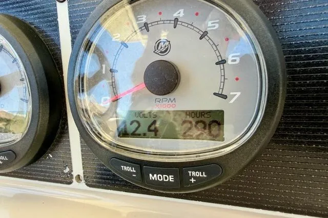 Slide: The Image of Gauge display on 2021 Boston Whaler 270 Dauntless showing RPM, volts, and hours. - 12