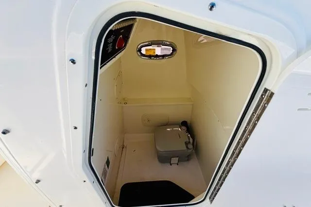 Slide: The Image of Interior view of a 2021 Boston Whaler 270 Dauntless boat compartment. - 20