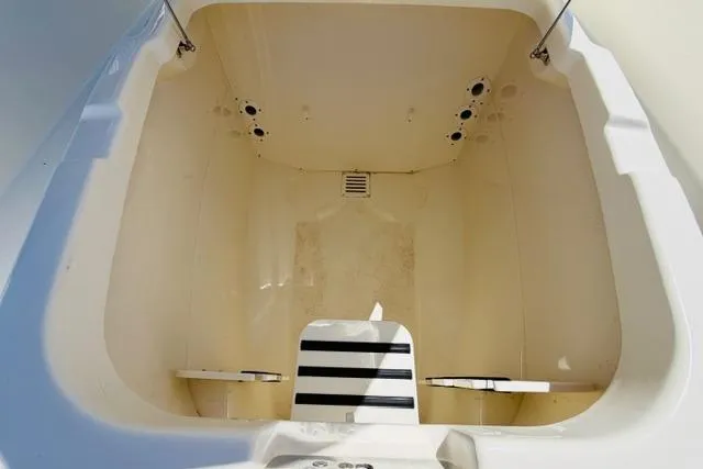 Slide: The Image of Interior view of a 2021 Boston Whaler 270 Dauntless boat compartment. - 23