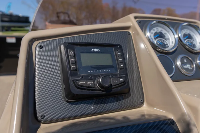 Slide: The Image of Dashboard of 2025 Starcraft EXS 3 boat with Wet Sounds audio system. - 10