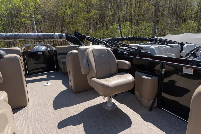Slide: The Image of 2025 Starcraft EXS 3 boat interior with beige seating and modern design. - 7