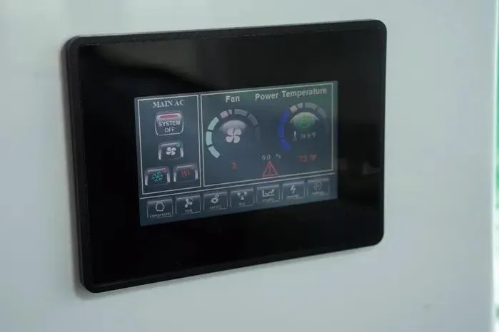 Slide: The Image of Touchscreen control panel on 2023 Axopar 37 XC Cross Cabin boat. - 11