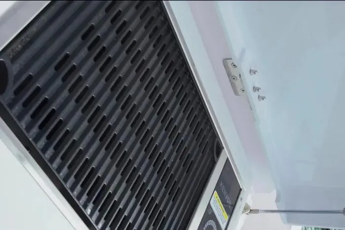 Slide: The Image of Grill detail on 2023 Axopar 37 XC Cross Cabin boat. - 17