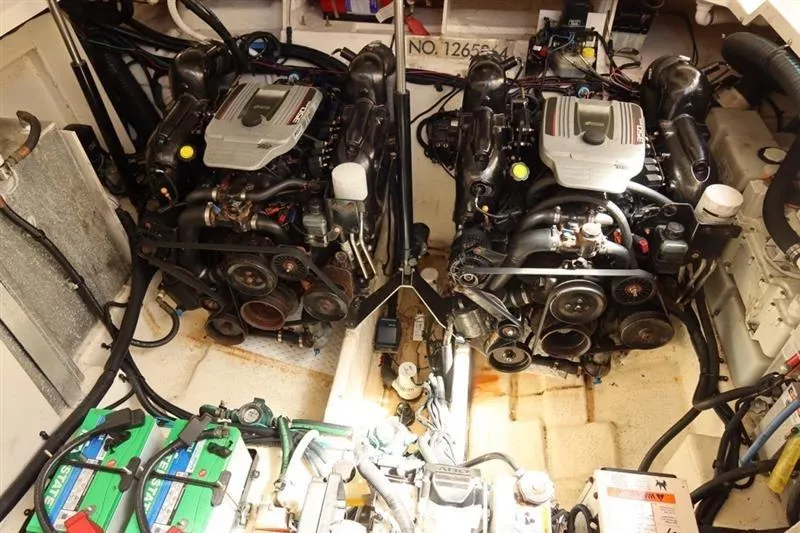 Slide: The Image of Engine room of a 2014 Sea Ray 330 Express Cruiser with dual engines. - 5