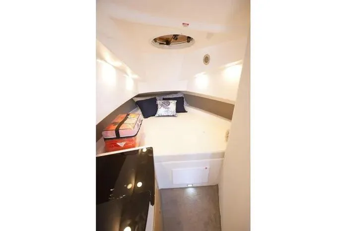 Slide: The Image of Cozy cabin interior of 2026 SeaWell 345XL boat with bed and pillows. - 11