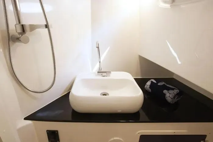 Slide: The Image of Modern bathroom sink and shower in 2026 SeaWell 345XL yacht. - 3