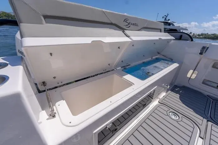Slide: The Image of 2026 SeaWell 345XL boat with open storage compartment, showcasing sleek design and functionality. - 8