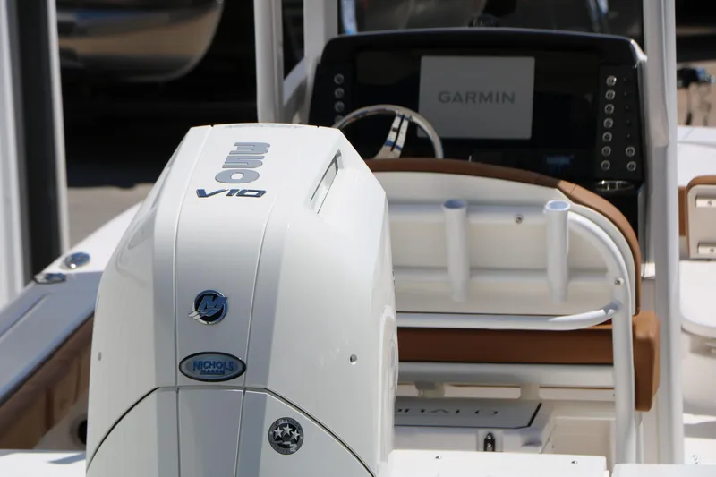 Slide: The Image of 2026 Robalo 246 Cayman boat with 350 V10 engine and Garmin navigation system. - 45