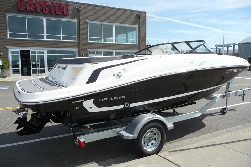 Slide: The Image of 2021 Bayliner VR5 Bowrider I/O on trailer outside Bayside dealership. - 2