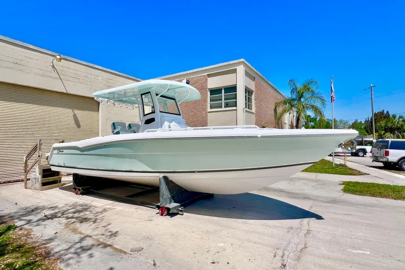 The Image of 2026 Stamas 31T Aventura boat displayed outdoors on a sunny day. - 0