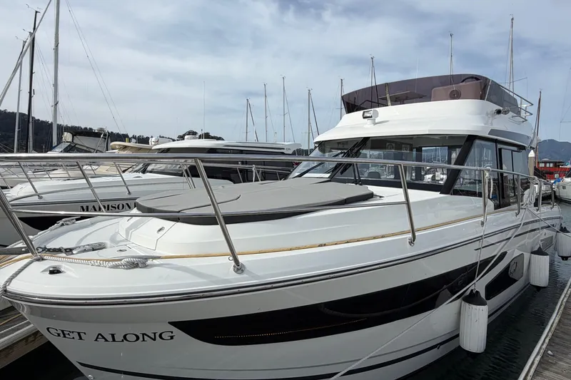 Slide: The Image of 2022 Jeanneau NC Weekender 1095 Fly yacht docked at marina. - 27