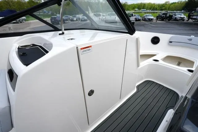 Slide: The Image of 2026 Bayliner VR6 Bowrider I/O interior with sleek design and spacious seating. - 14