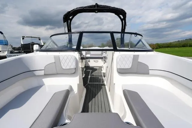 Slide: The Image of 2026 Bayliner VR6 Bowrider I/O interior with sleek seating and modern design. - 16