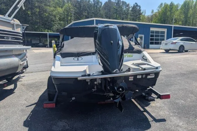 Slide: The Image of 2021 Tahoe T16 boat with outboard motor in a parking lot. - 5