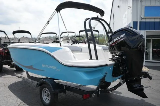 Slide: The Image of 2026 Bayliner M17 boat with Mercury engine on trailer, parked outdoors. - 15
