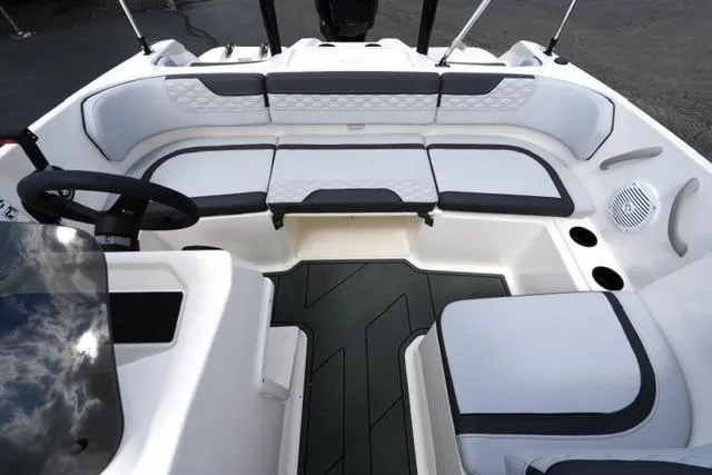 Slide: The Image of 2026 Bayliner M17 boat interior with sleek seating and modern design. - 20
