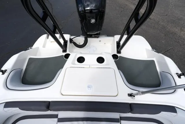 Slide: The Image of 2026 Bayliner M17 boat interior with seating and motor, showcasing modern design. - 23