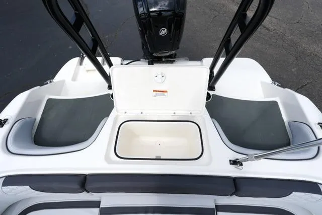 Slide: The Image of 2026 Bayliner M17 boat interior with open storage compartment and seating. - 24