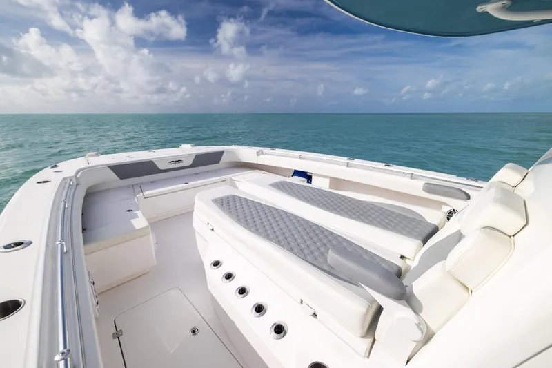 Slide: The Image of Luxurious 2023 Invincible 37 Catamaran interior with ocean view and comfortable seating. - 10
