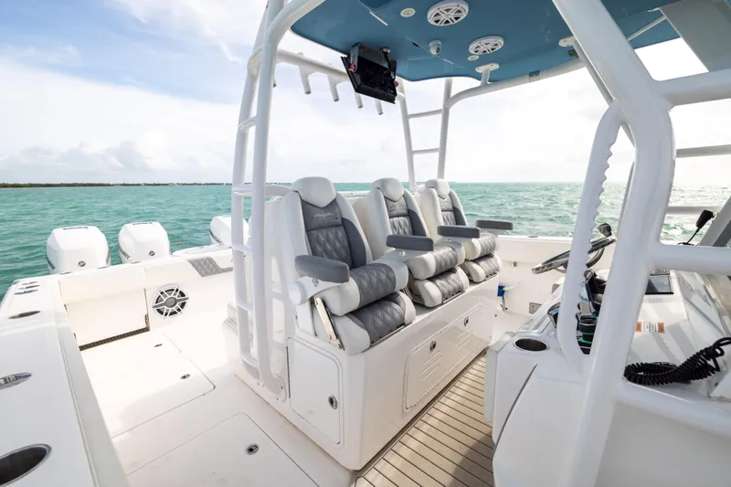 Slide: The Image of 2023 Invincible 37 Catamaran interior with luxurious seating and ocean view. - 19