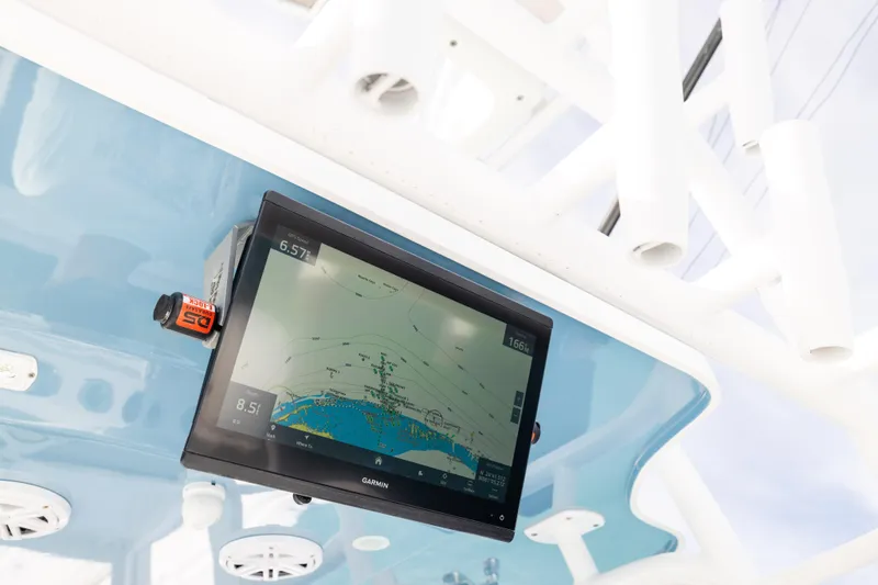 Slide: The Image of Garmin navigation display on 2023 Invincible 37 Catamaran, showcasing marine chart details. - 31
