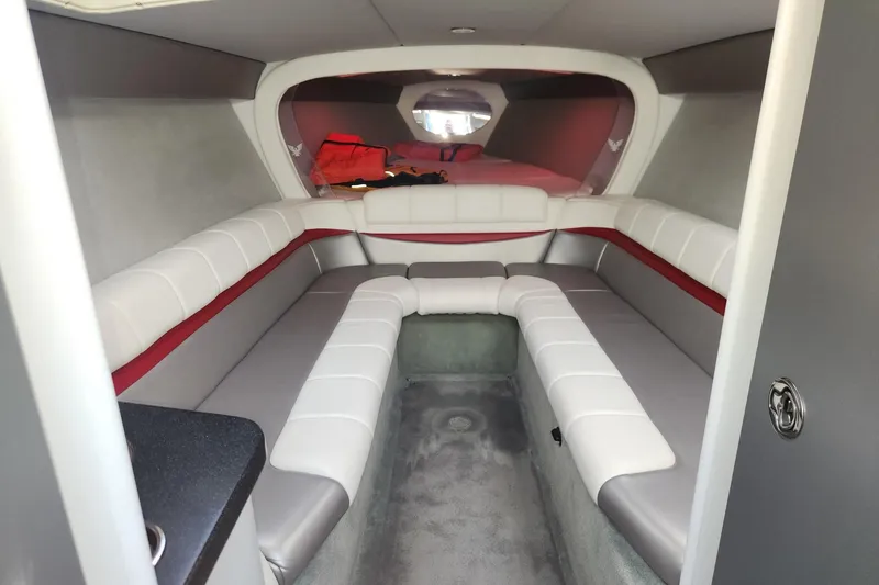 Slide: The Image of Interior of a 2008 Formula 353 FASTech boat with cushioned seating and modern design. - 10