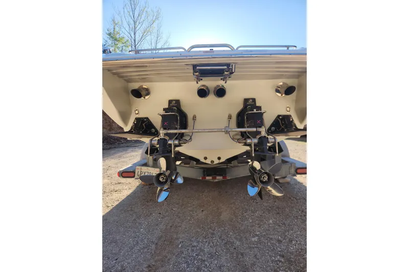 Slide: The Image of Rear view of 2008 Formula 353 FASTech boat with dual propellers and outboard motors. - 9