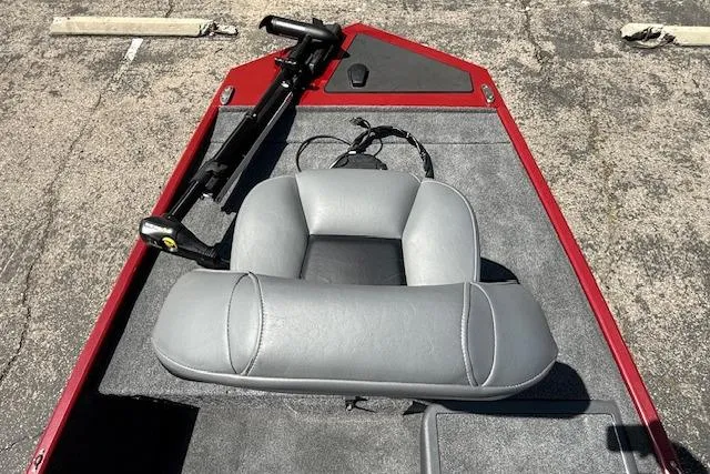 Slide: The Image of 2026 Tracker Bass Tracker Classic XL boat interior with gray seating and trolling motor. - 13