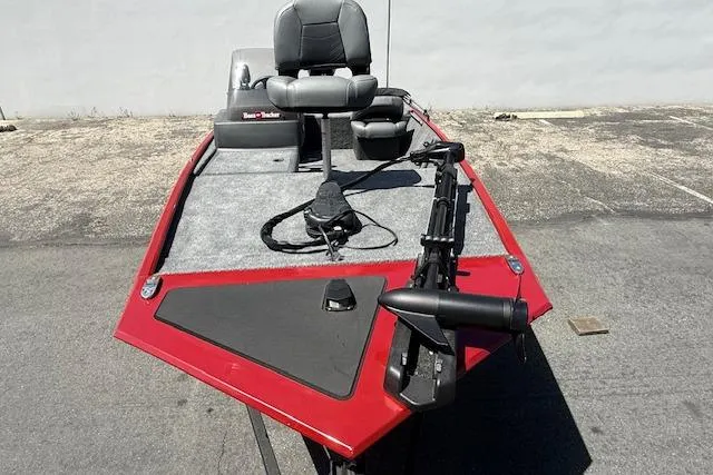 Slide: The Image of 2026 Tracker Bass Tracker Classic XL boat with red exterior and fishing seats. - 21
