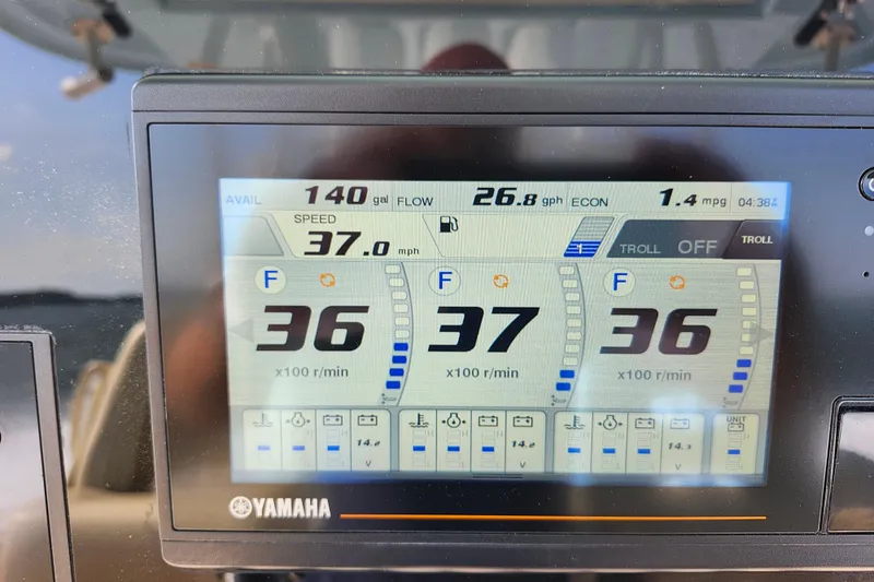 Slide: The Image of Yamaha display on 2019 Cobia 344 Center Console showing speed and fuel data. - 22