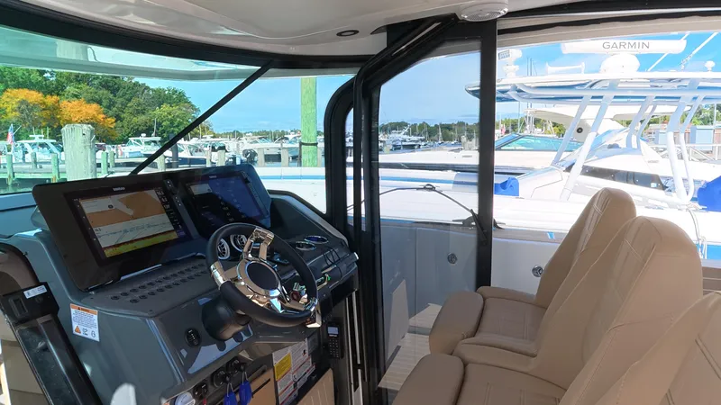 Slide: The Image of The 2027 Saxdor 400 GTS cockpit features modern navigation systems and comfortable seating. - 19