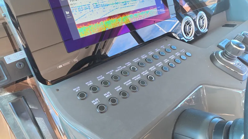 Slide: The Image of The image shows the dashboard of a Saxdor 400 GTS with modern controls and a screen. - 23