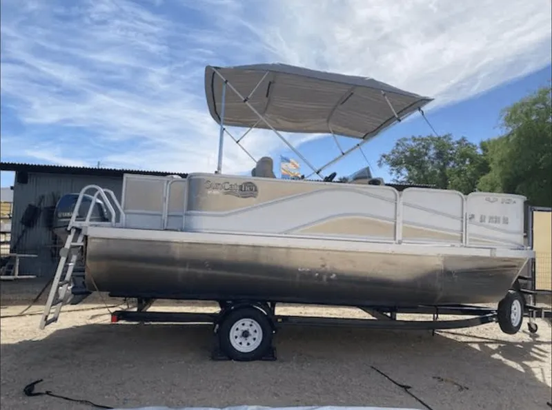 The Image of 2019 SunCatcher 18F Pontoon boat with canopy on trailer. - 0
