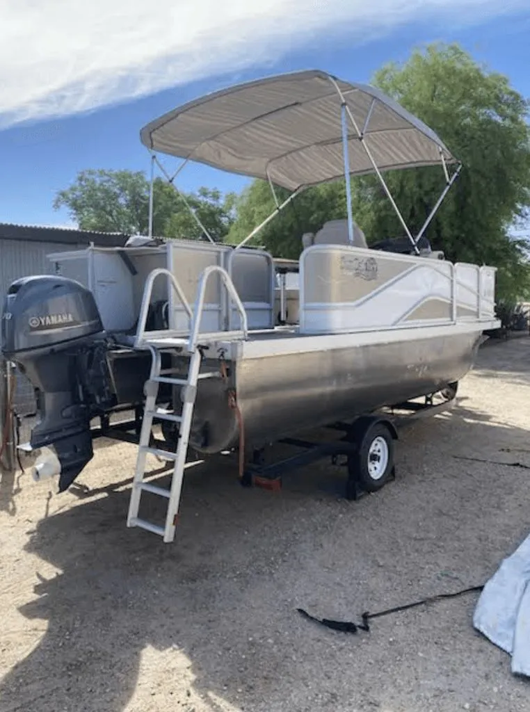 Slide: The Image of 2019 SunCatcher 18F Pontoon boat with Yamaha motor on trailer. - 3