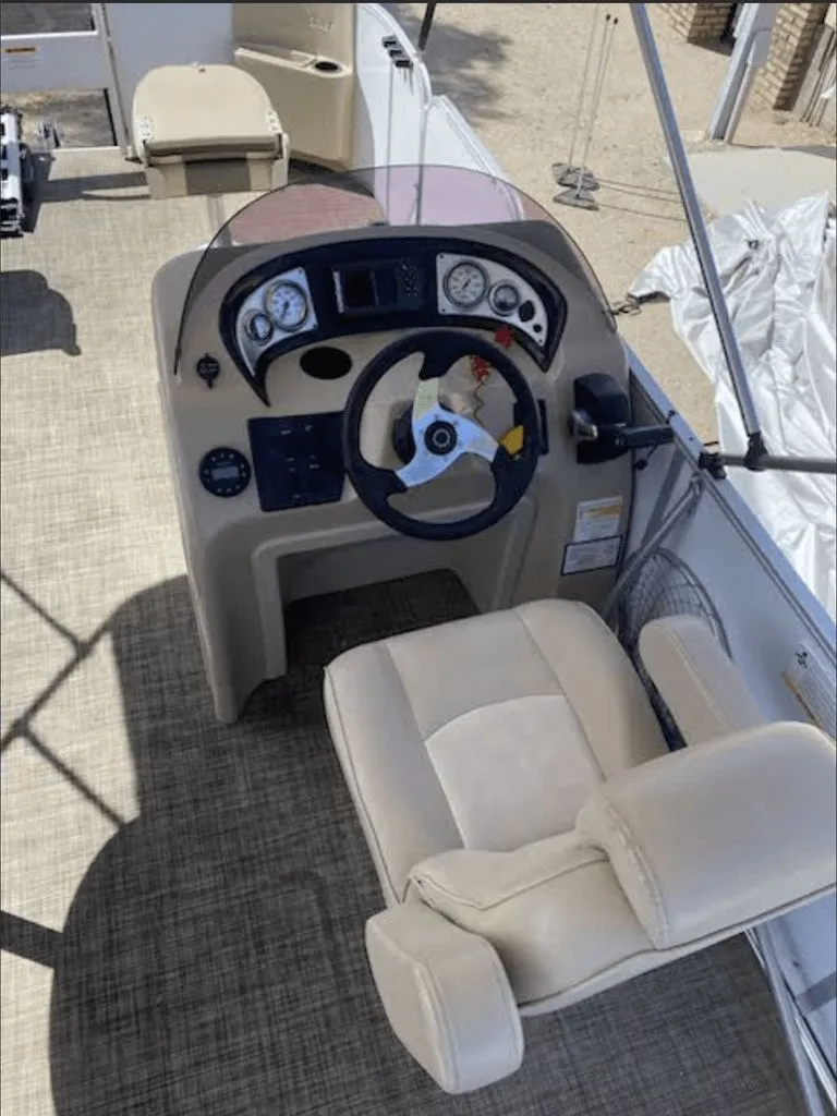 Slide: The Image of Cockpit of a 2019 SunCatcher 18F Pontoon boat. - 4