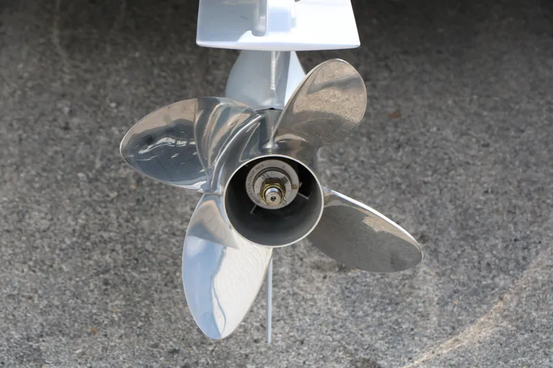 Slide: The Image of 2026 Vexus AVX 1985s boat propeller on concrete surface. - 12