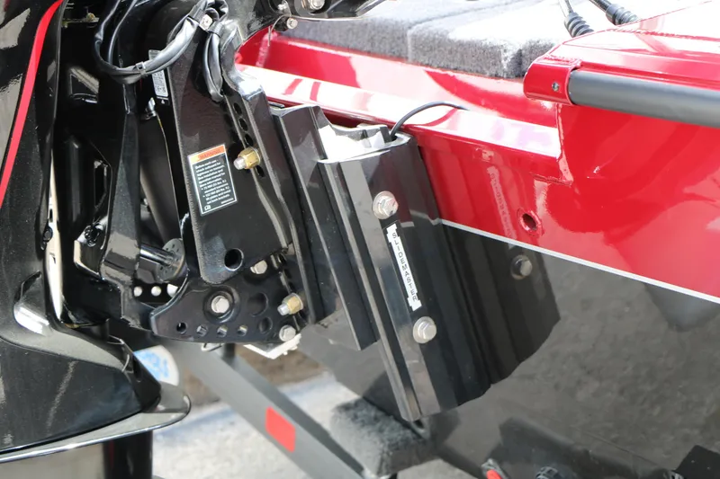 Slide: The Image of 2026 Vexus AVX 1985s boat motor mount detail with red and black finish. - 13