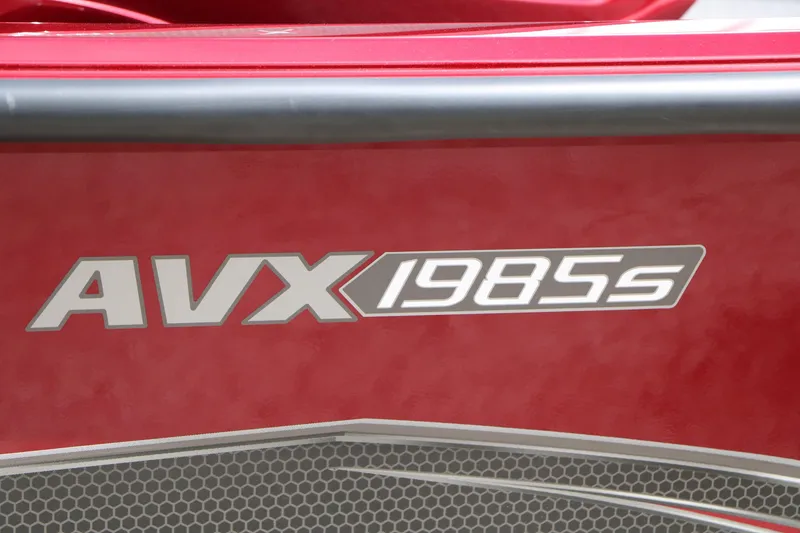 Slide: The Image of Red Vexus AVX 1985s boat, model year 2026, with bold lettering. - 16