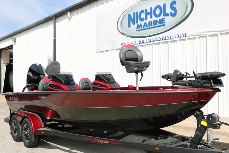 Slide: The Image of 2026 Vexus AVX 1985s boat at Nichols Marine dealership. - 4