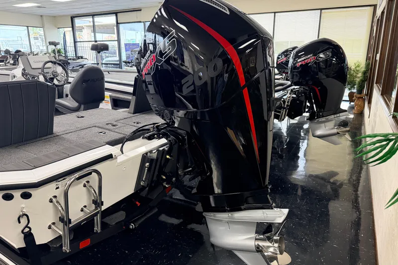 Slide: The Image of 2026 Vexus AVX 1985s boat with Mercury Pro XS 200 engine in showroom. - 3