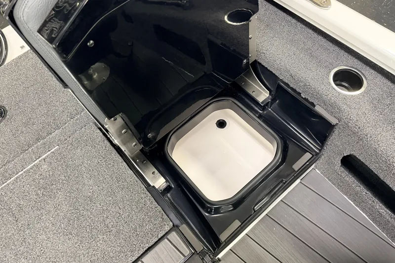 Slide: The Image of Open storage compartment in 2026 Vexus AVX 1985s boat, featuring sleek design and durable materials. - 37