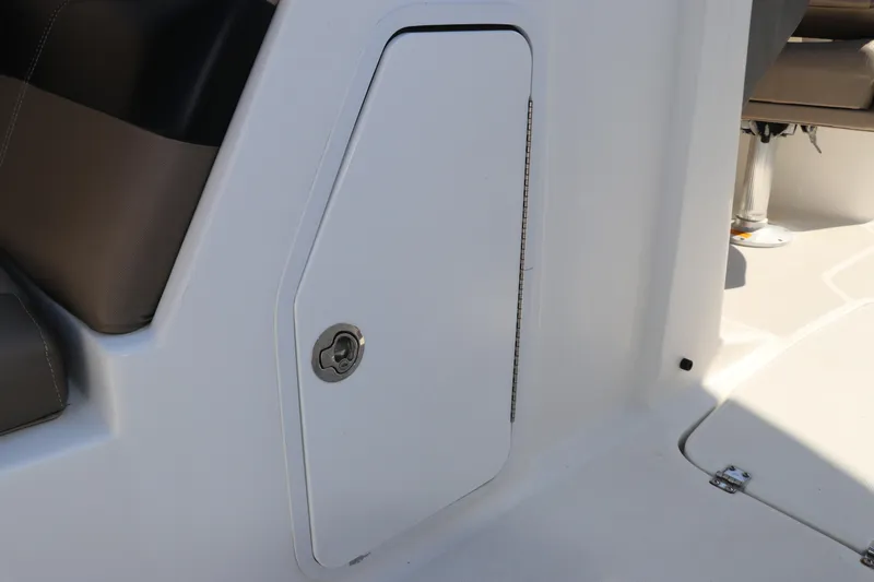 Slide: The Image of 2016 Hurricane SunDeck 2486 OB boat interior storage compartment with seating. - 20