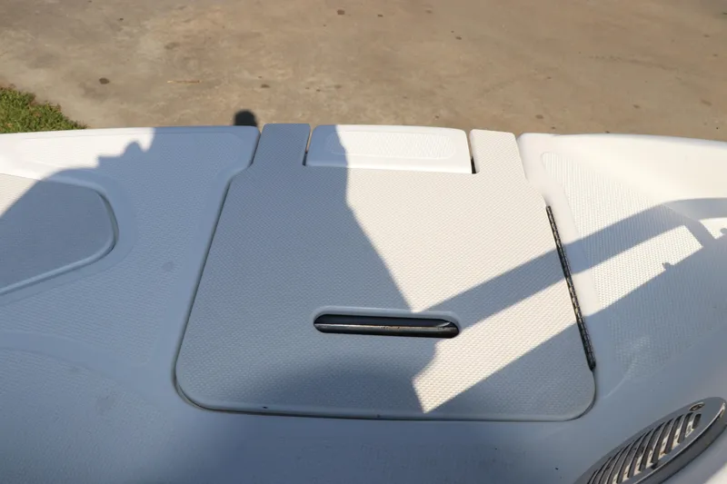 Slide: The Image of 2016 Hurricane SunDeck 2486 OB boat deck with textured surface and shadows. - 34