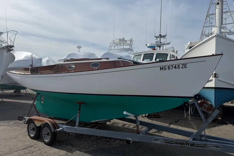 Slide: The Image of 1998 Bridges Point BP 24 sailboat on a trailer. - 3